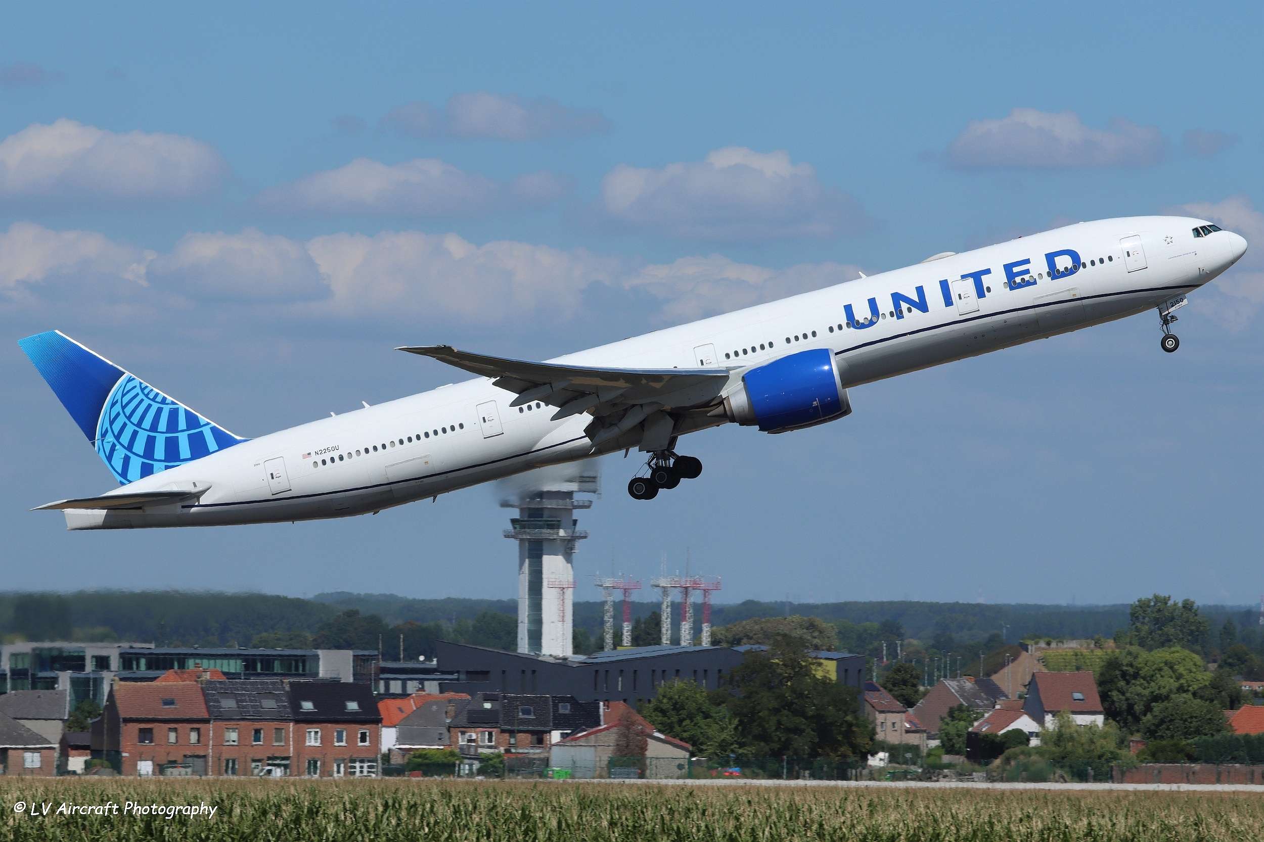 A United Airlines Boeing 7777-300ER departs Brussels in Belgium