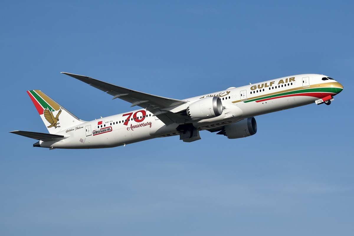 A Gulf Air Boeing 787 wearing the Retro Livery departing London Heathrow