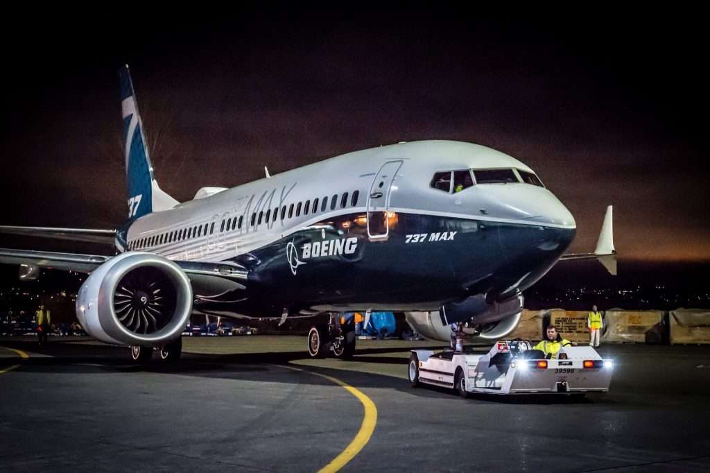 A Boeing 737 MAX 7 rolls out for the firs time.
