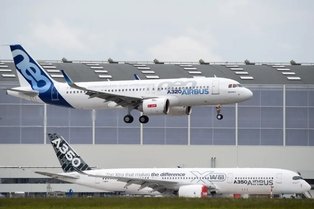 An Airbus A320neo and A350 parked