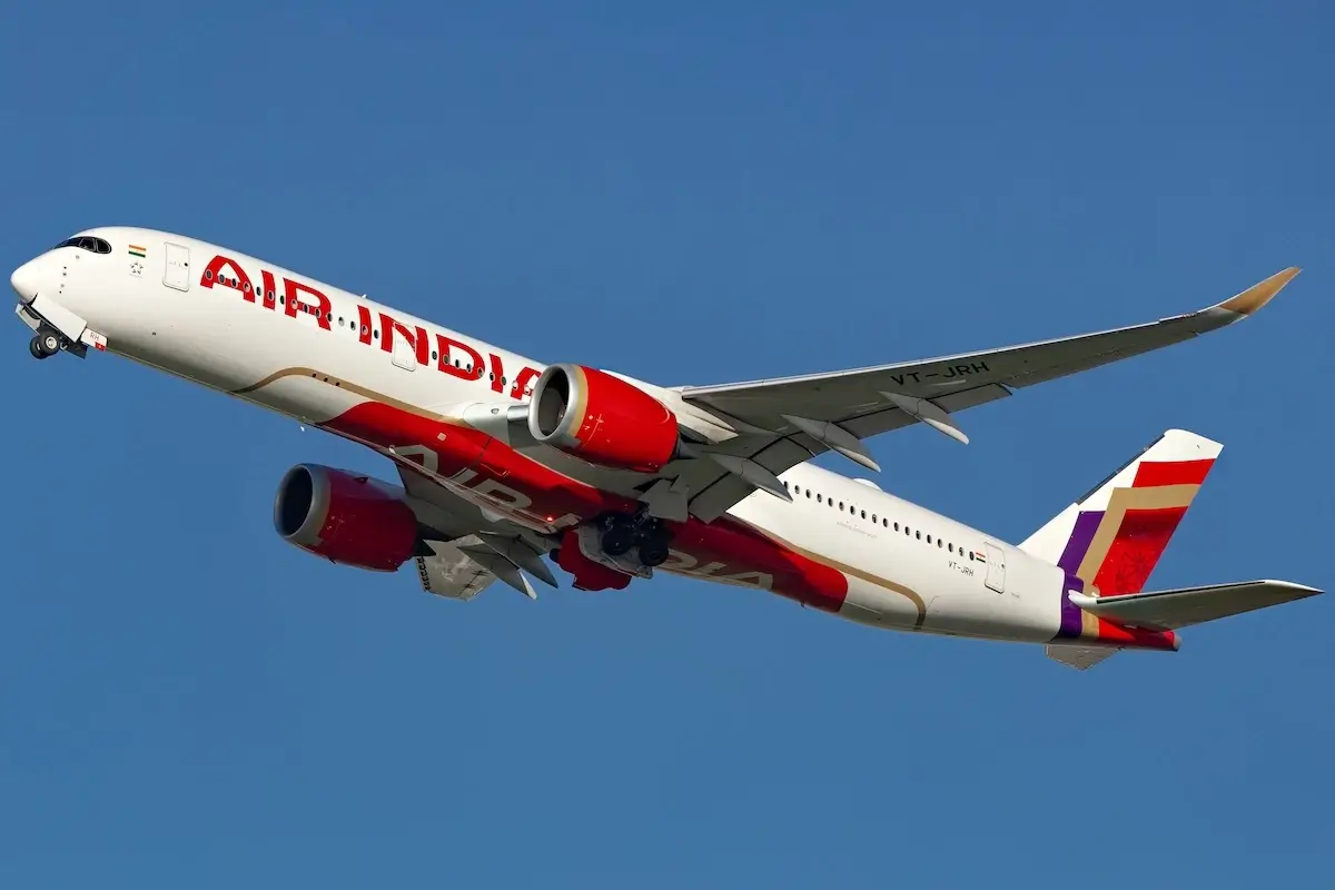 Air India Airbus A350 in the new livery taking off in a clear blue sky