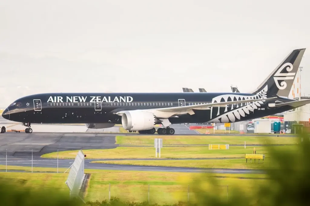 Air New Zealand ZK-NZE Boeing 787-9 Dreamliner parked at Auckland International Airport.