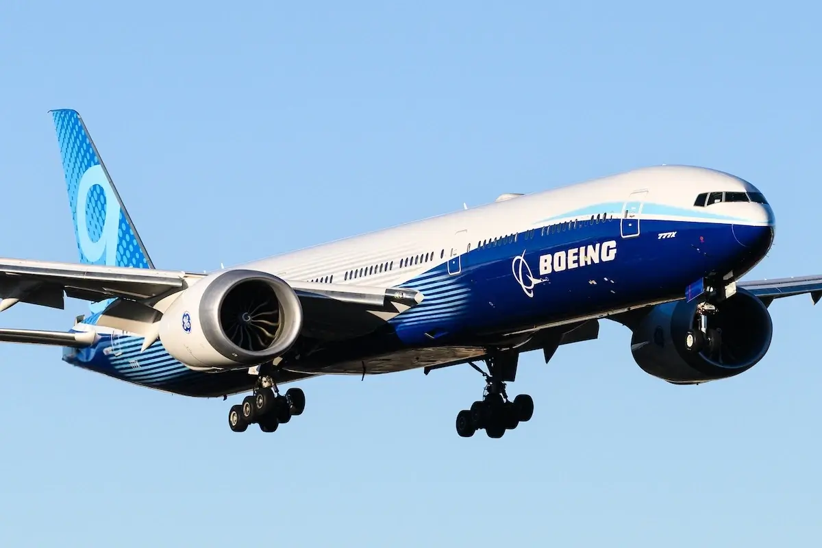 Boeing livery 777-9 prototype of 777X aircraft wheels down landing as N779XX