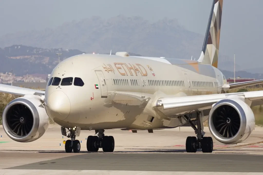 An Etihad Airways Boeing 787-9 Dreamliner on the taxiway at El Prat Airport in Barcelona, Spain