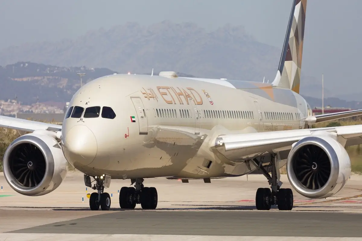 An Etihad Airways Boeing 787-9 Dreamliner on the taxiway at El Prat Airport in Barcelona, Spain