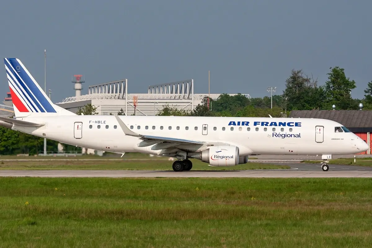 Regional Embraer 190 in Air France livery with registration F-HBLE on take off roll on runway 18 of Frankfurt Airport