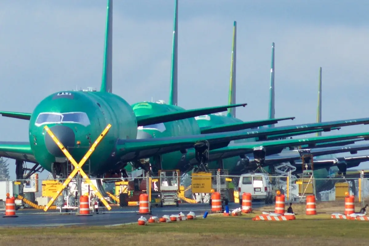 Brand new Boeing 787 Dreamliner with no engines and paintinnnng waiting to be completed and for a successful test flight at Snohomish County Airport or Paine