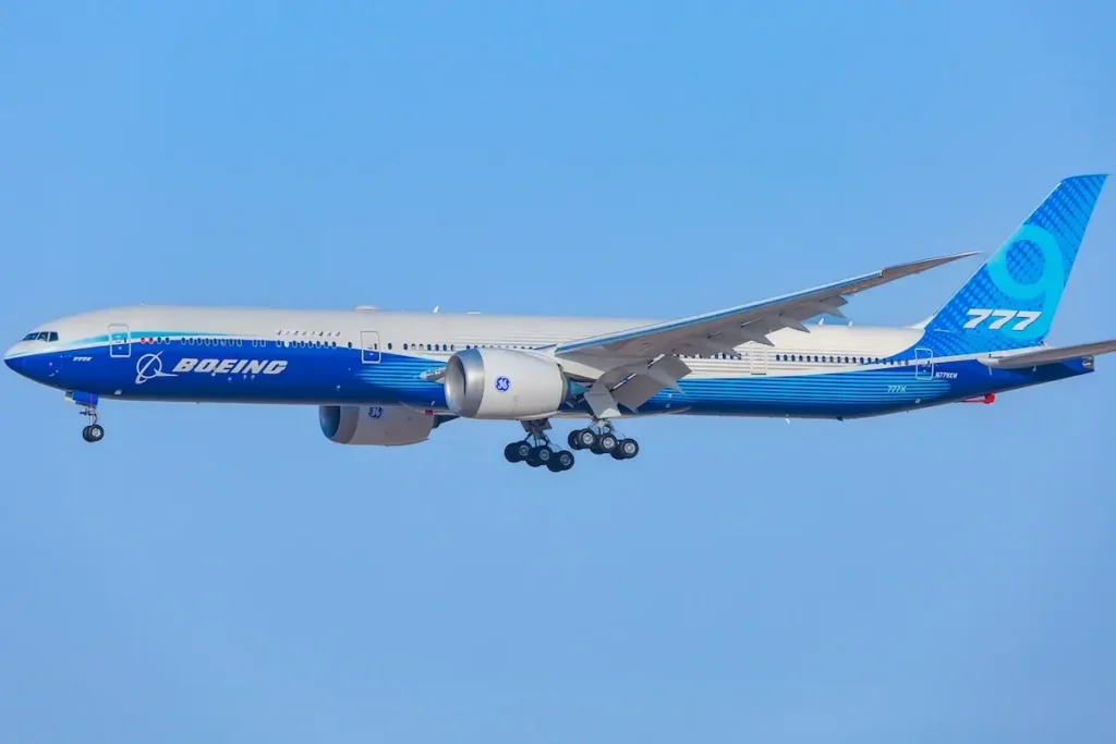 Dubai, United Arab Emirates - November 15, 2021: A Boeing 777X aircraft on final approach to land in full landing configuration, whilst performing an aerial display at the Dubai Airshow.