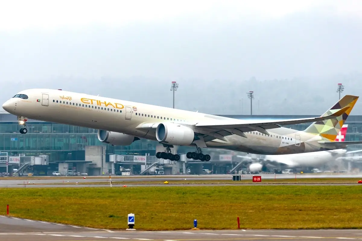 Zurich, Switzerland, January 22, 2025 A6-XWB Etihad Airbus A350-1041 aircraft is taking off from runway 28 on a rainy day