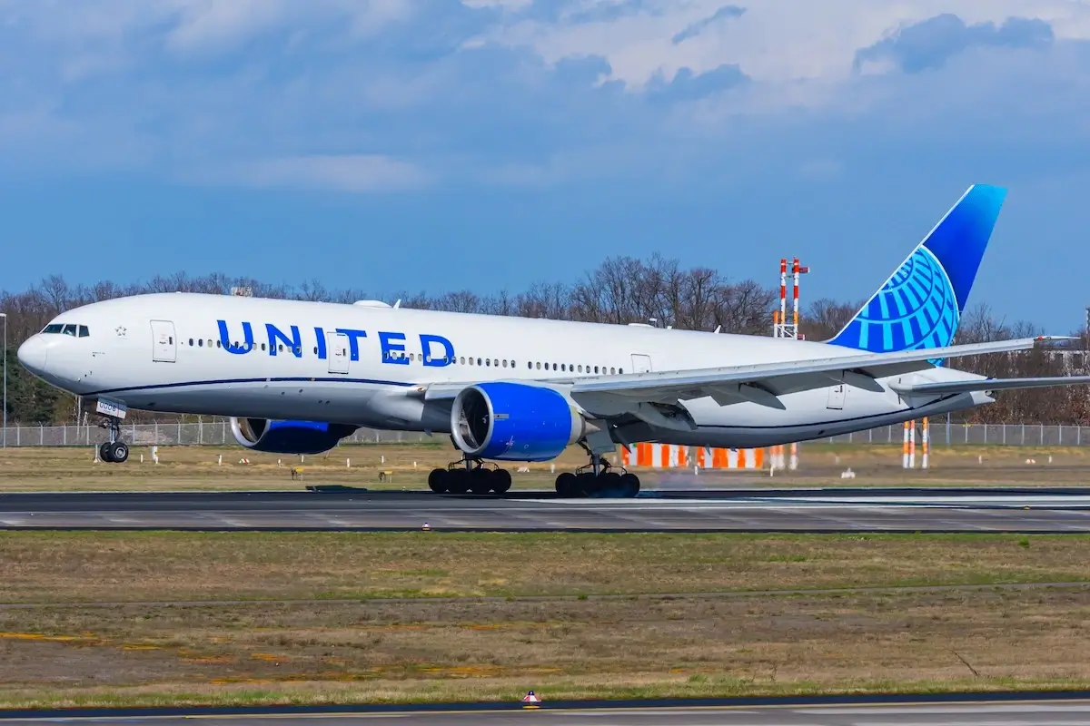 Frankfurt, Hessen, Germany - March 23, 2024: United Airlines Boeing 777-200ER is heading to its gate after landing at Frankfurt International Airport.