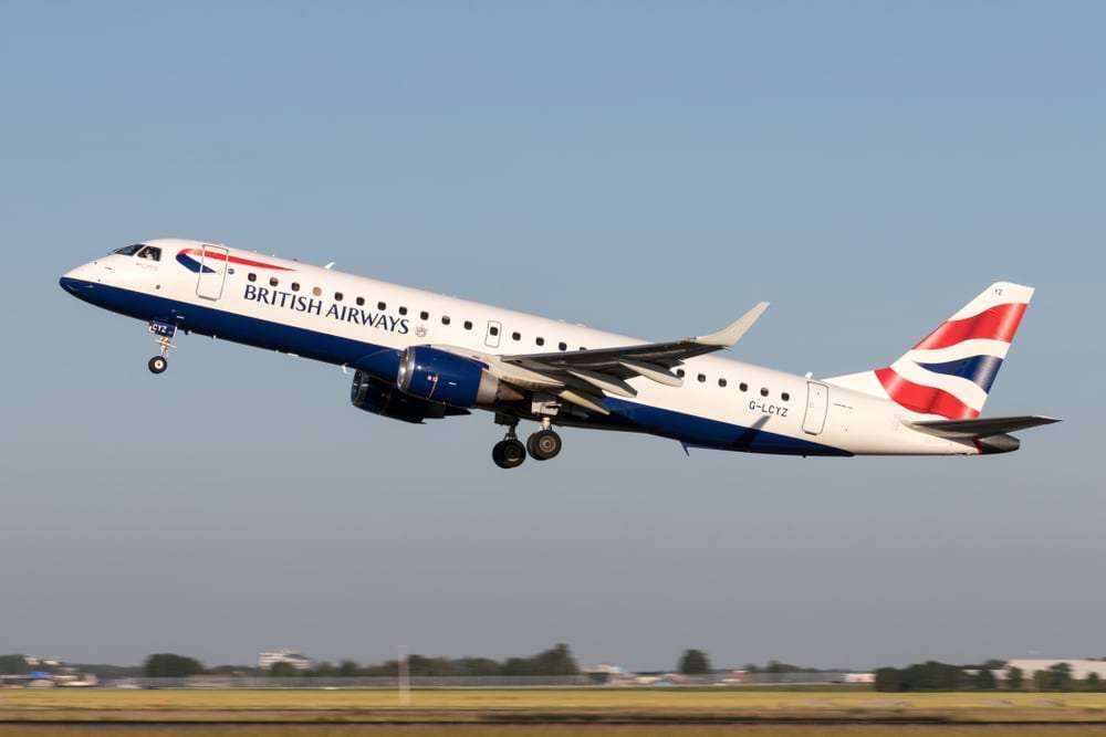 VIJFHUIZEN, THE NETHERLANDS - June 28, 2019: BA Cityflyer Embraer ERJ-190 with registration G-LCYZ taking off runway 36L (Polderbaan) of Amsterdam Airport Schiphol.