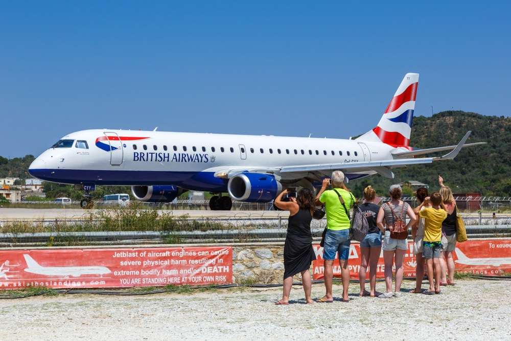 Skiathos, Greece – July 29, 2019: British Airways BA CityFlyer Embraer 190 airplane at Skiathos airport (JSI) in Greece.