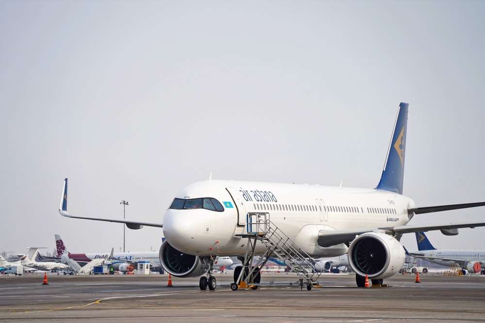 Almaty, Kazakhstan - 03.07.2024 : The Air Astana plane is parked at the airport parking lot.