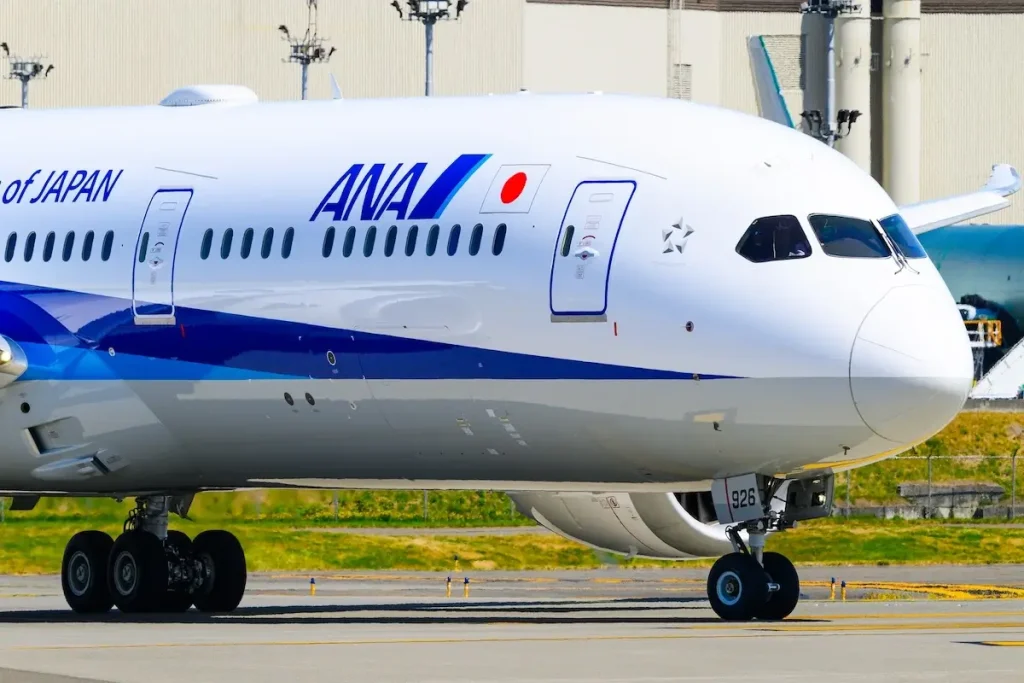 Everett, WA, USA - July 11, 2024; ANA Boeing 787 JA926A aircraft taxiing onto runway with brand and logo in closeup