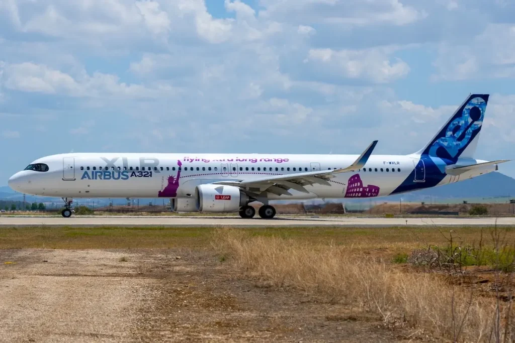 Moron, Spain - 3 May 23: An Airbus A321 XLR aircraft on the runway under a partly cloudy sky