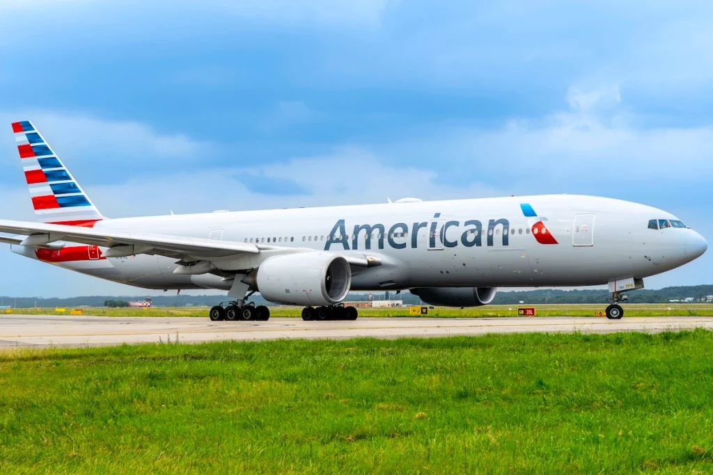 Varese, Italy. June 7, 2025. Boeing 777 American Airlines aircraft is taxiing at MXP Milano Malpensa international airport