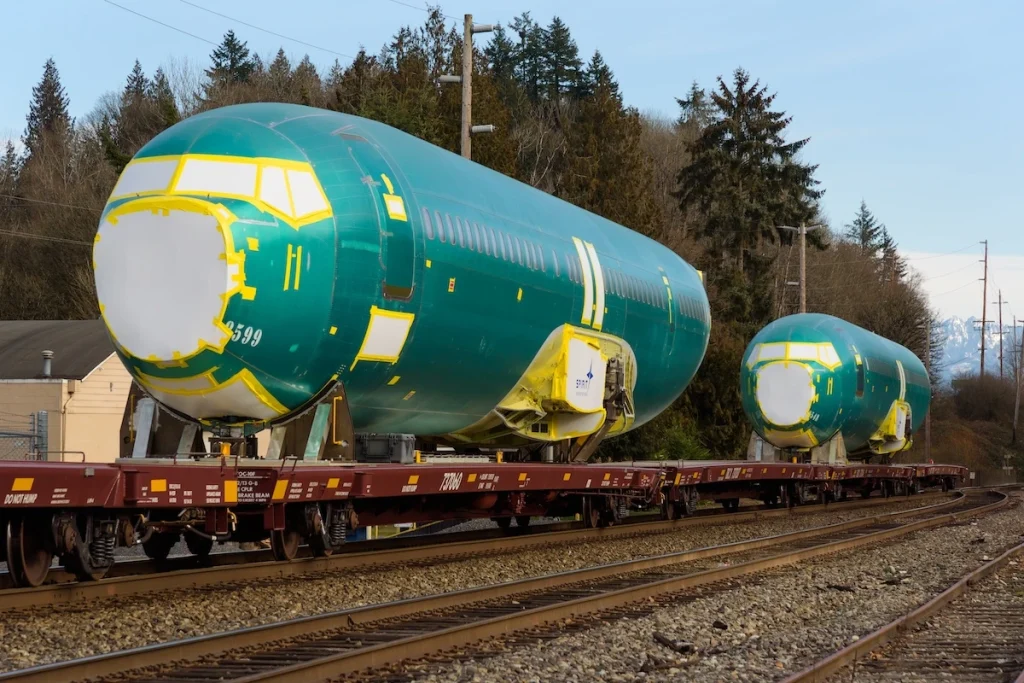 Monroe, WA, USA - February 1, 2023; Boeing 737 aircraft fuselage shipment on BNSF train from Spirit Aerosystems