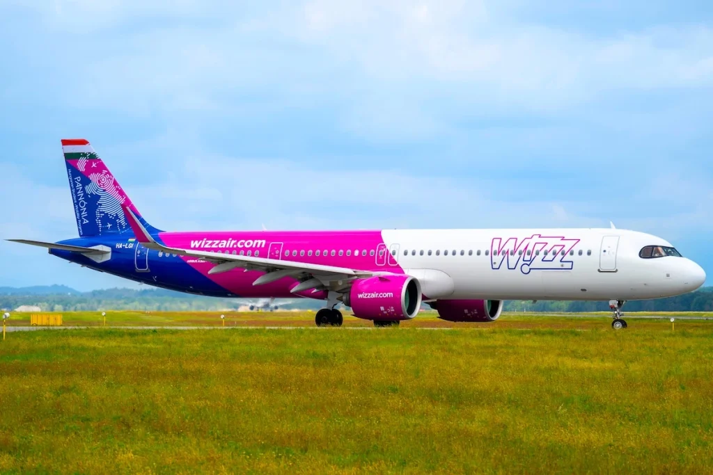 Varese, Italy. October 7, 2025. Wizzair Airbus A321 NEO is taxiing at MXP Milano Malpensa international airport. Pannonia Scholarship Livery