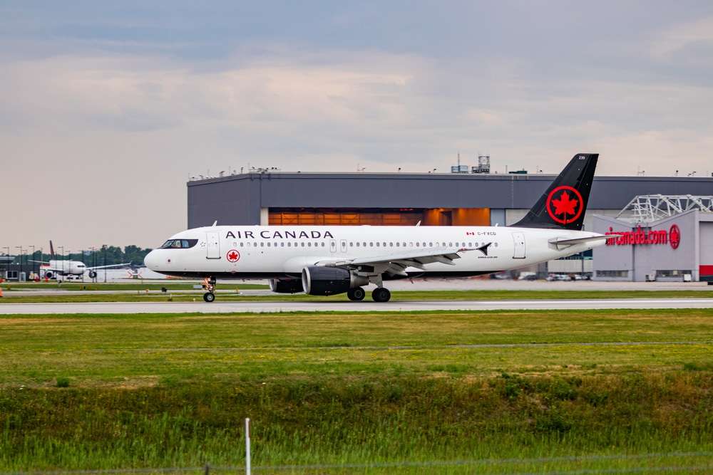 Montreal, Quebec / Canada - 07/02-2020 : Air Canada A320-200 Landing at Montreal's international Airport on a cloudy evening.