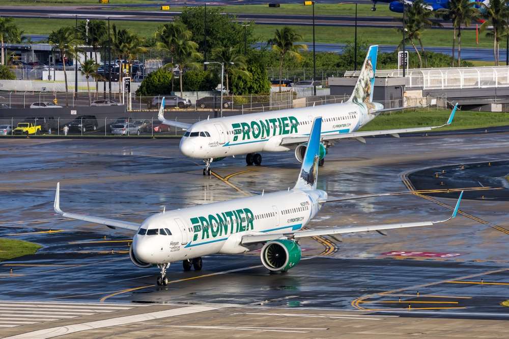 San Juan, Puerto Rico - August 3, 2025: Frontier Airlines Airbus A321neo airplanes at San Juan airport in Puerto Rico.