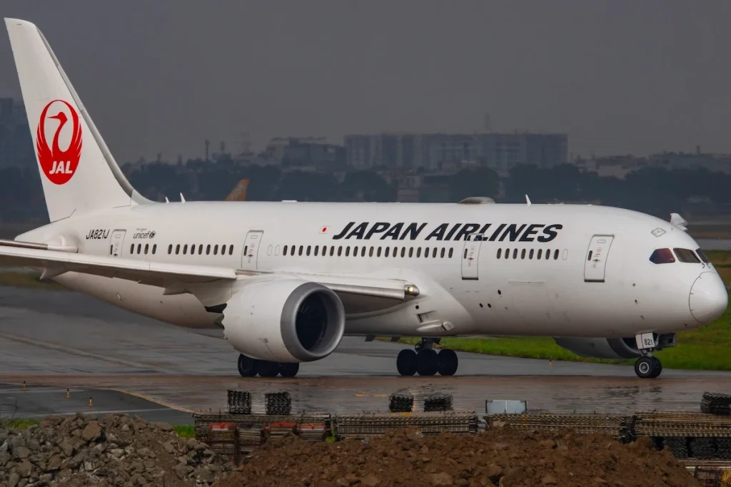 Ho Chi Minh city, Viet Nam-04262025: Boeing 787-8 Dreamliner reg JA821J of Japan Airlines departure after the rain at Ho Chi Minh City International Airport