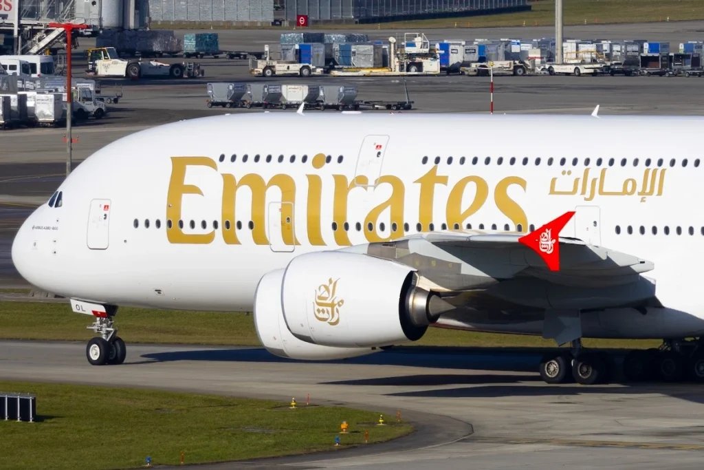 Zurich Airport, Switzerland - November 28, 2025: Emirates Airbus A380-800 passenger airplane reg. A6-EOL featuring revised company livery on a taxiway at Zurich airport on a sunny autumn day