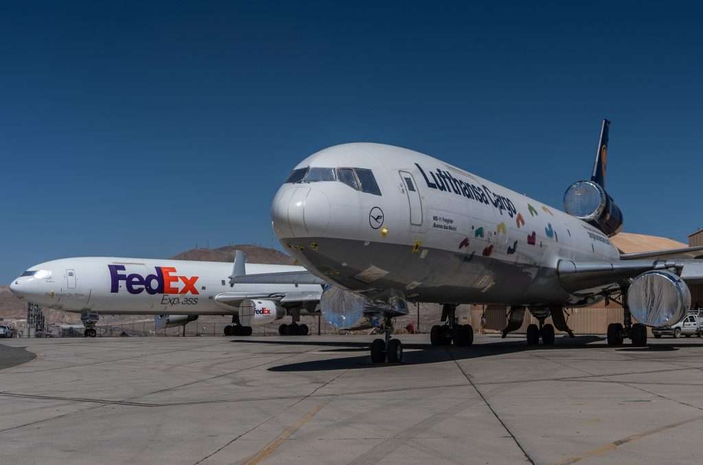 Victorville, California, USA, June 2021, Southern California logistics airport, aka as Victorville Airport, Lufthansa and FEDEX McDonnell Douglas MD-11cargo airplanes, stored due to coronavirus