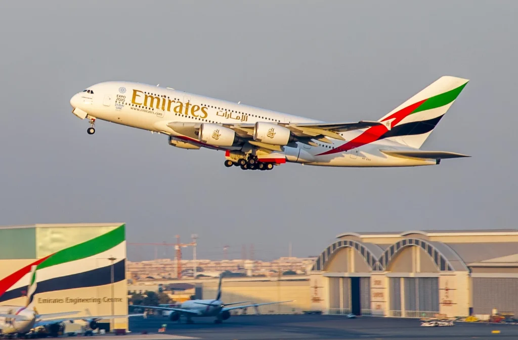 Dubai, United Arab Emirates - DECEMBER 19: An A380 Emirates take off at Emirates Terminal 3 airport at Dubai, UAE on December 19 2015. Airbus A380 is the world's biggest jet airliner.