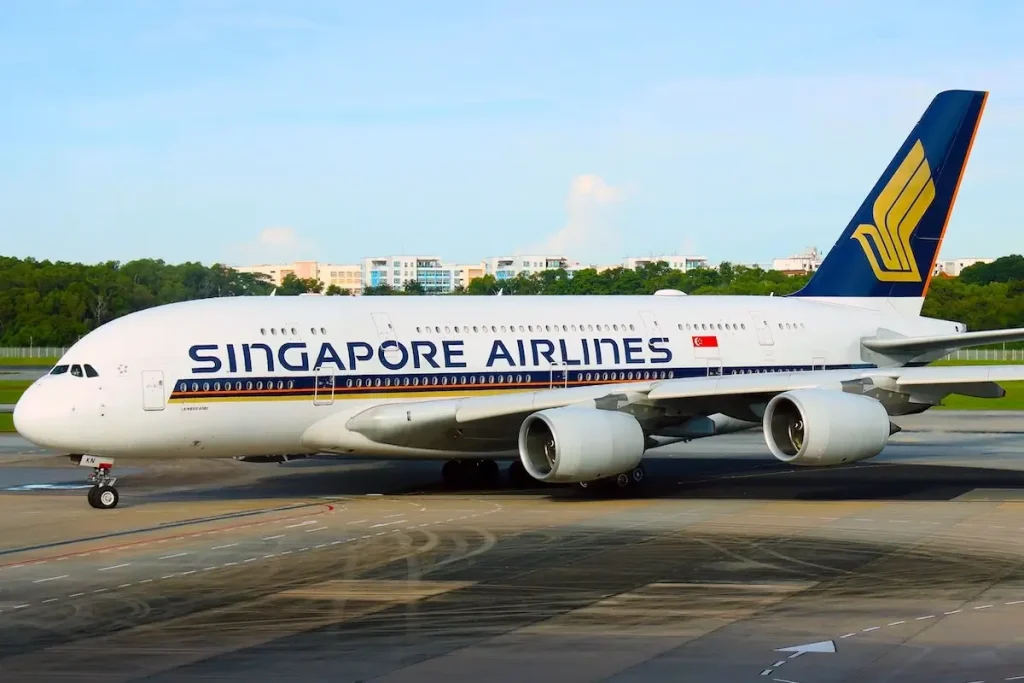Changi. Singapore - Nov 20 2022 - Singapore Airlines Airbus A380-900 taxi to the gate at the terminal of Singapore Changi International Airport.