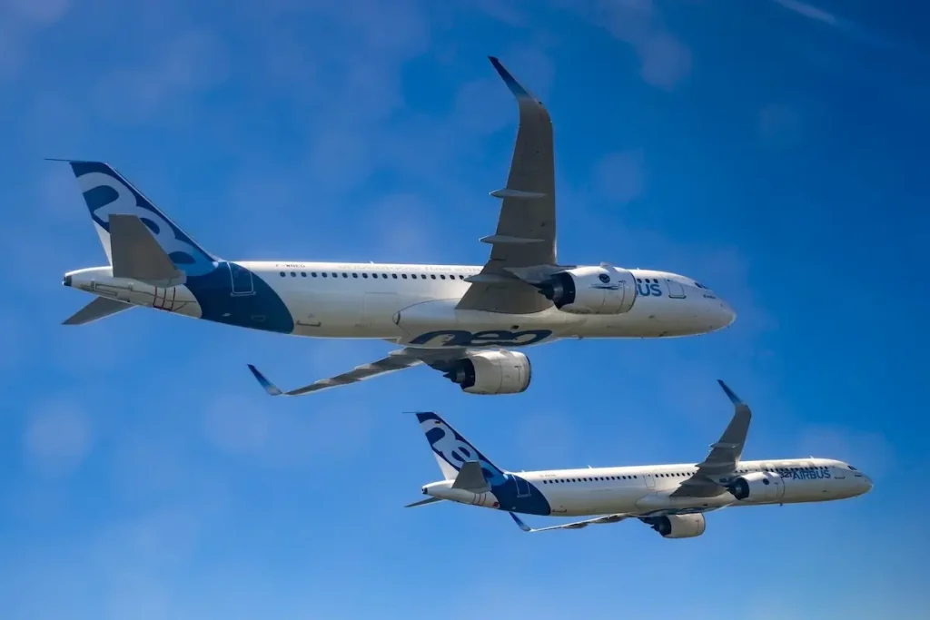 An Airbus A320neo and A321neo in formation