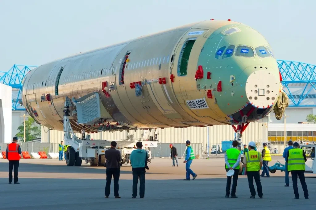an Airbus A350-1000 during rollout and in production