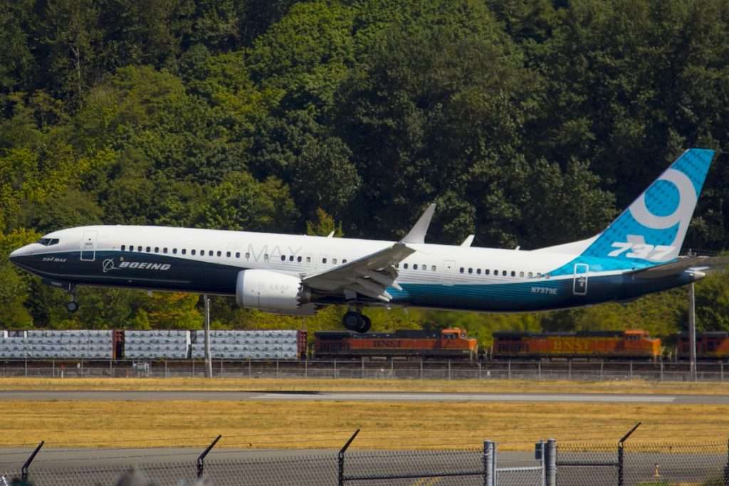 A Boeing 737-9 MAX lands at Boeing Field