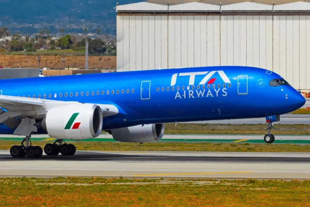 Los Angeles, California, United States - March 31, 2024: ITA Airways EI-IFC, Airbus A350-900 aircraft shown touching down at LAX, Los Angeles International Airport.