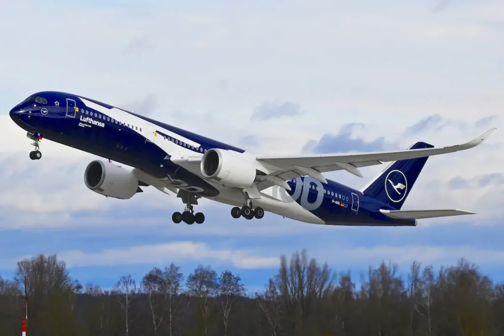 Lufthansa Airbus A350 wearing the 100 years livery departs