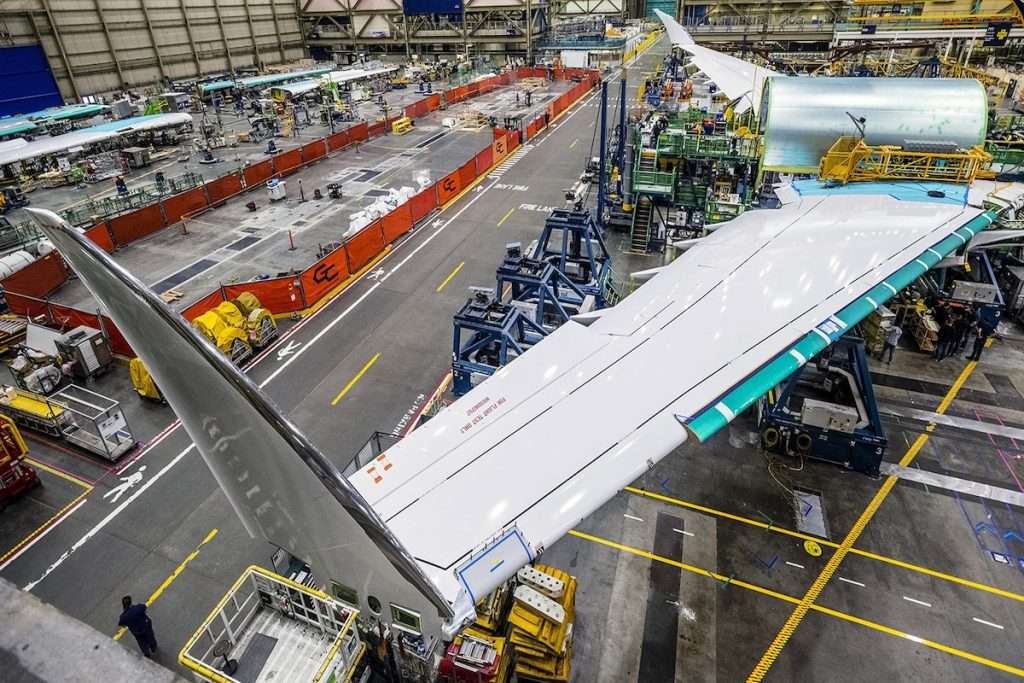 The 777-8F Freighter wings and mid-fuselage section come together in wing-body join. (Marian Lockhart photo)