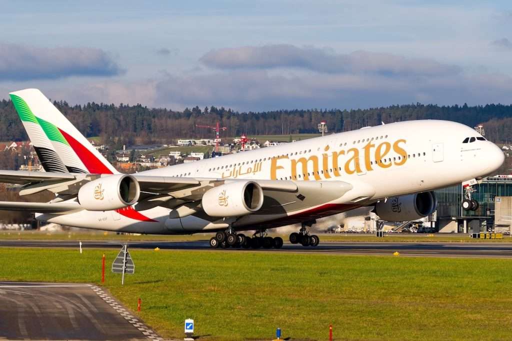 Emirates passenger airplane Airbus A380-800 registration A6-EDF taking off form Swiss Zürich Airport on an autumn day