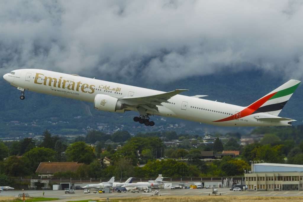 Emirates Boeing 777-300ER departs from Geneva in Switzerland
