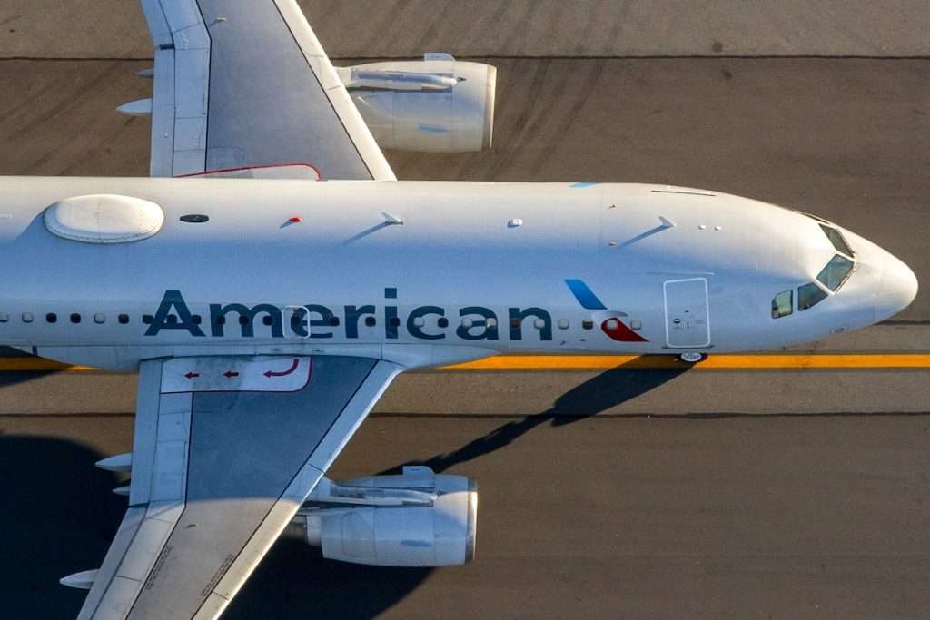 BOSTON, US - Aug 31, 2022: An aerial shot of American Airlines Airbus 319 taxiing at Boston's Logan International Airport