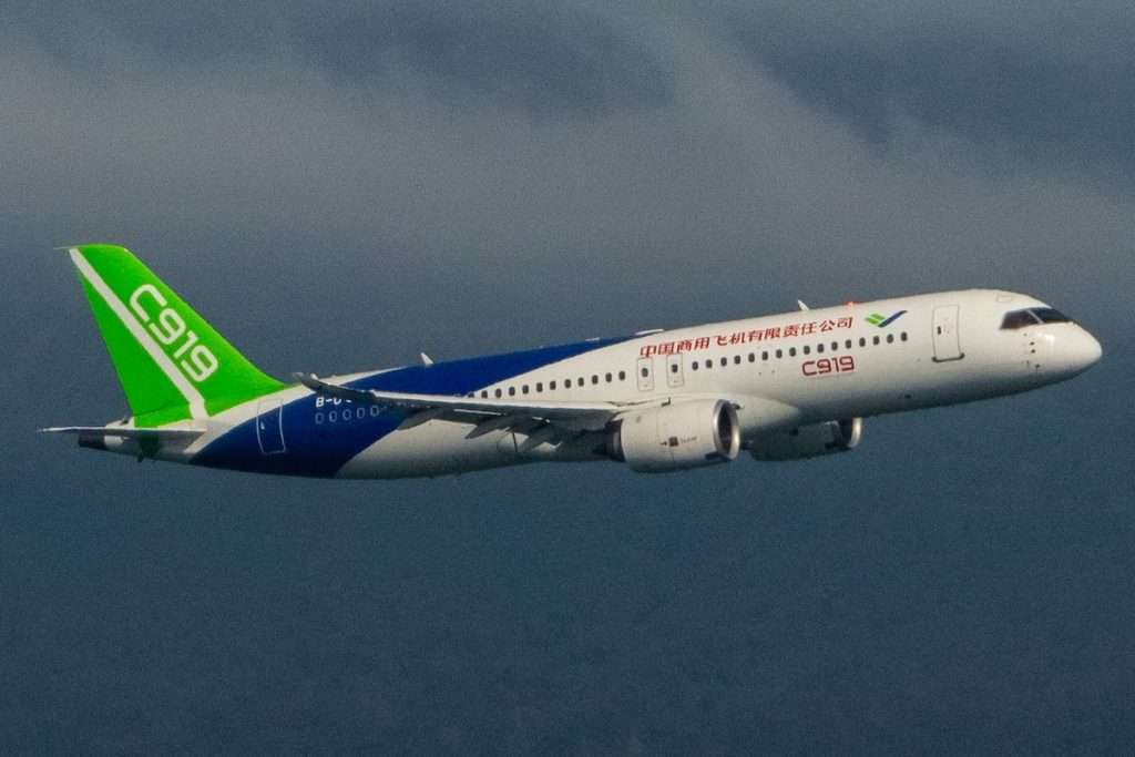 Hong Kong-December 16, 2023: C919 aircraft, one of the new passenger jets made in China, conducts a flight demonstration over Victoria Harbour. The C919 visits Hong Kong for the first time