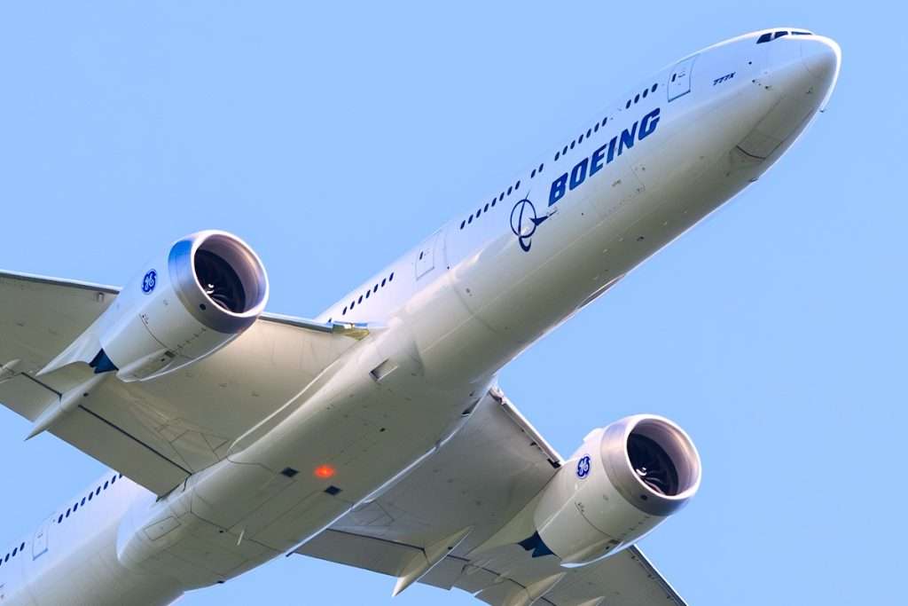 Duvall, WA, USA - August 8, 2025; Boeing 777-9 test aircraft registration N779XY from below in Boeing corporate livery a 777X passenger jet