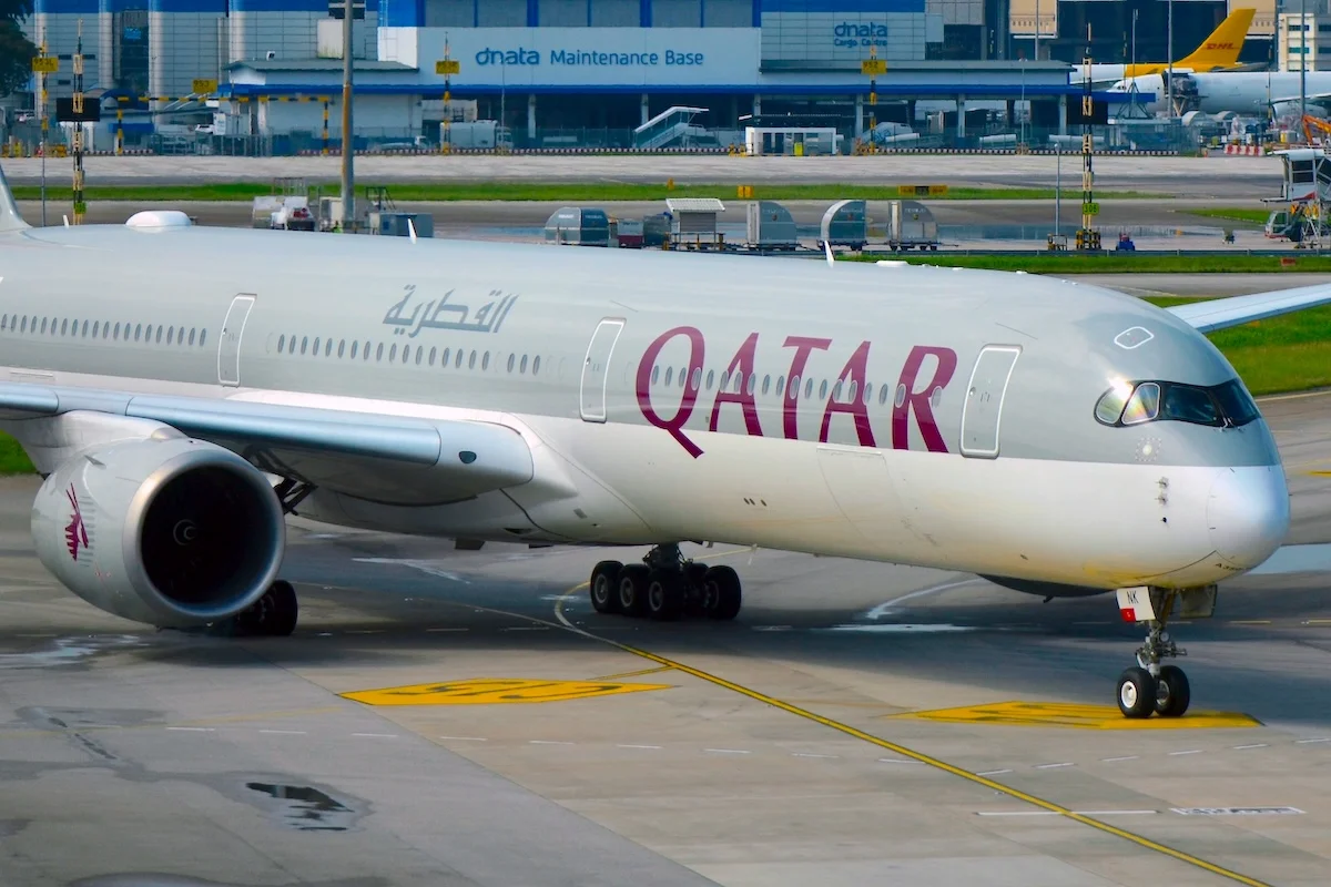 A close-up view of Qatar Airways Airbus A350 heading to one of Singapore Changi's Terminal 1 apron