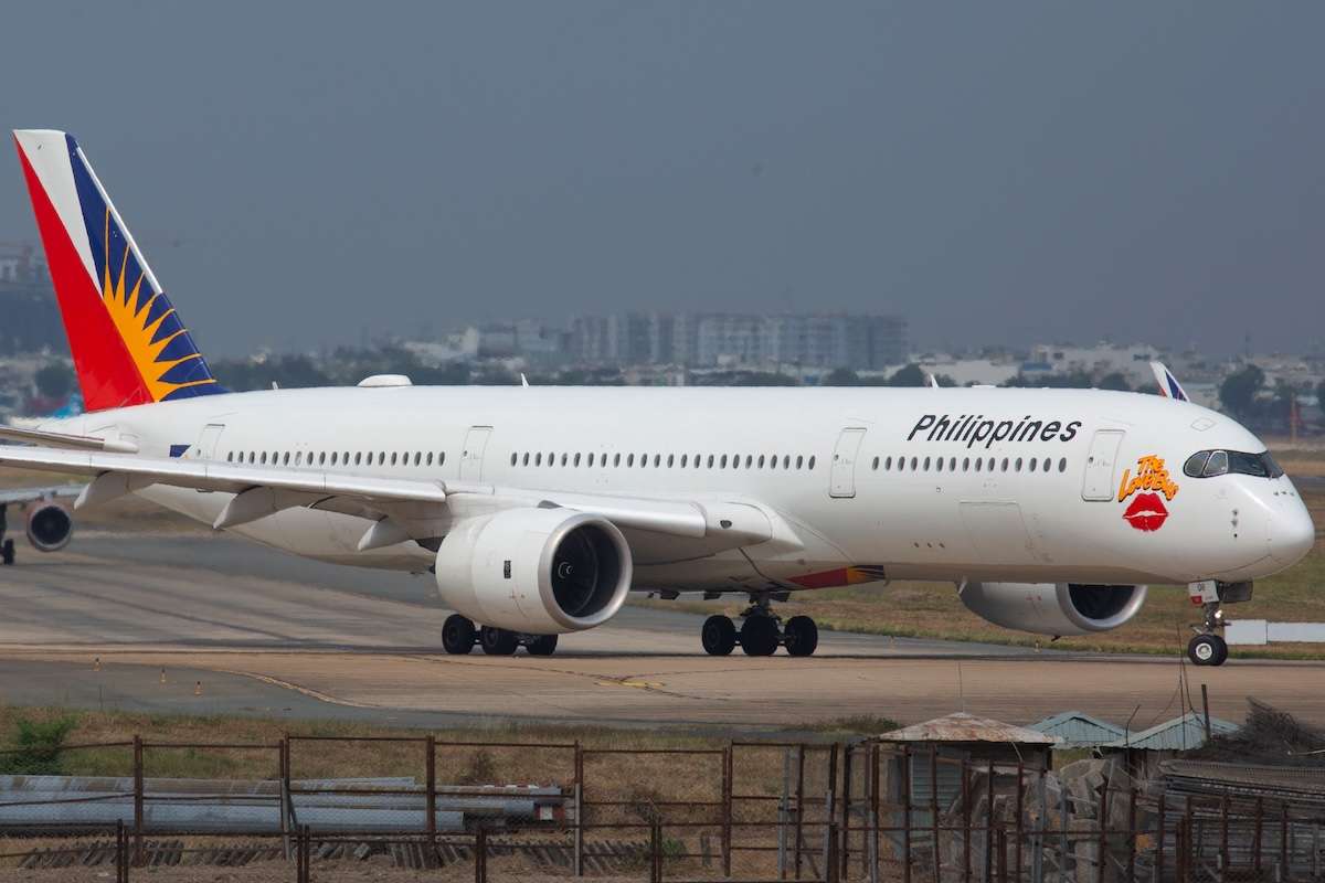 Ho Chi Minh city, Viet Nam-05252023: Airbus A350-941 with registration RP-C3508 of Philippine Airlines have The love bus sticker prepare to take off from Ho Chi Minh international Airport.