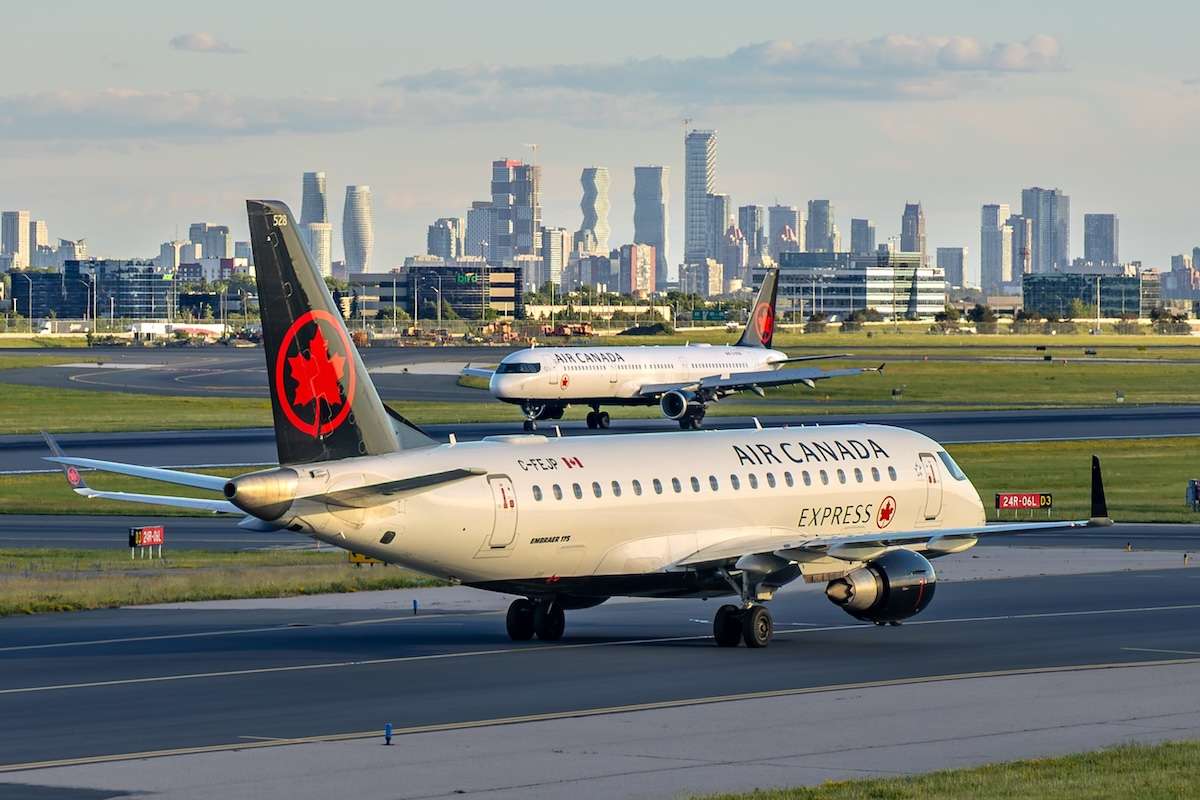 wo Air Canada passenger aircraft taxi at Toronto Pearson airport before the skylin