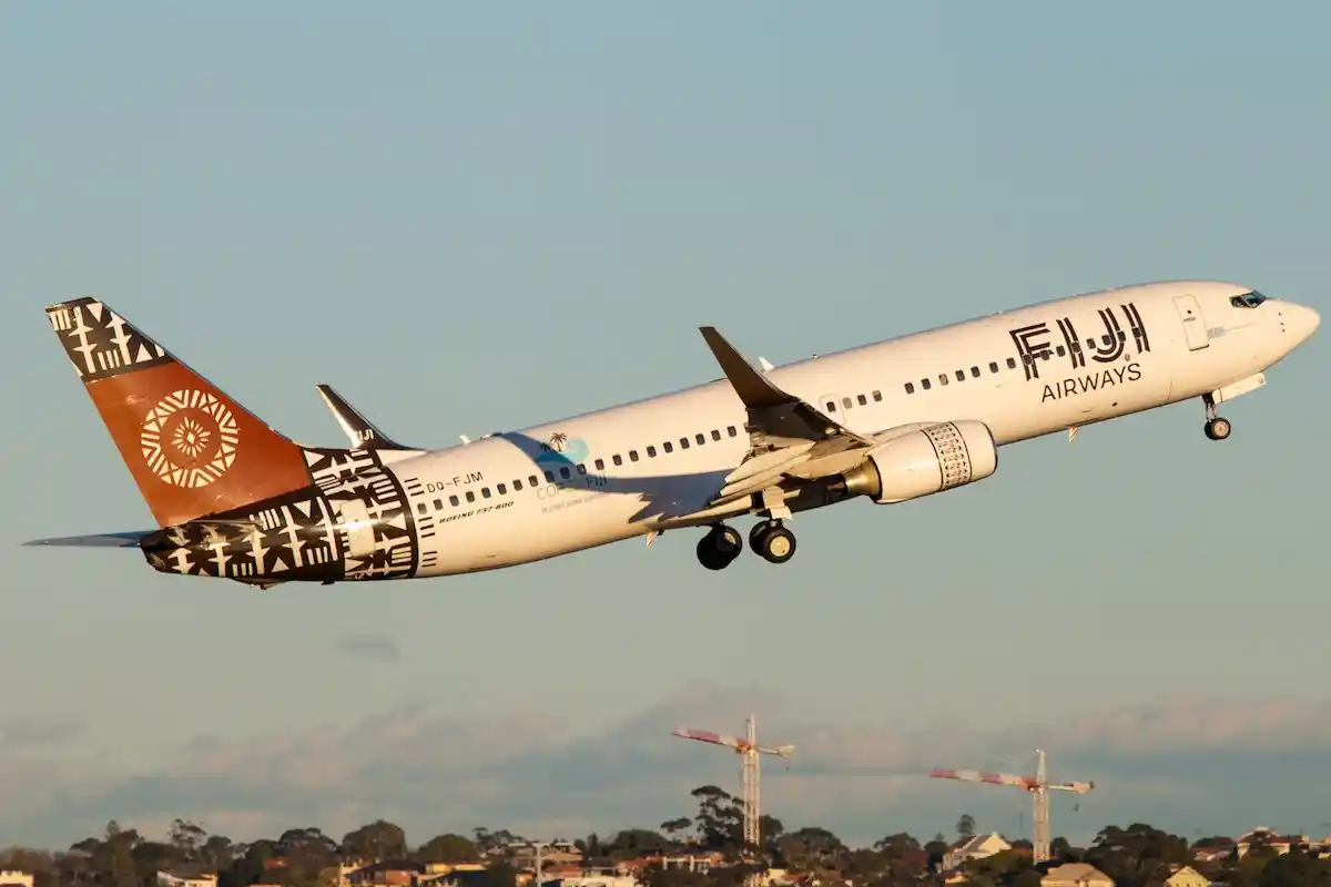 Fiji Airways Boeing 737 take off at Sydney Kingsford Smith Airport. Registration DQ-FJM