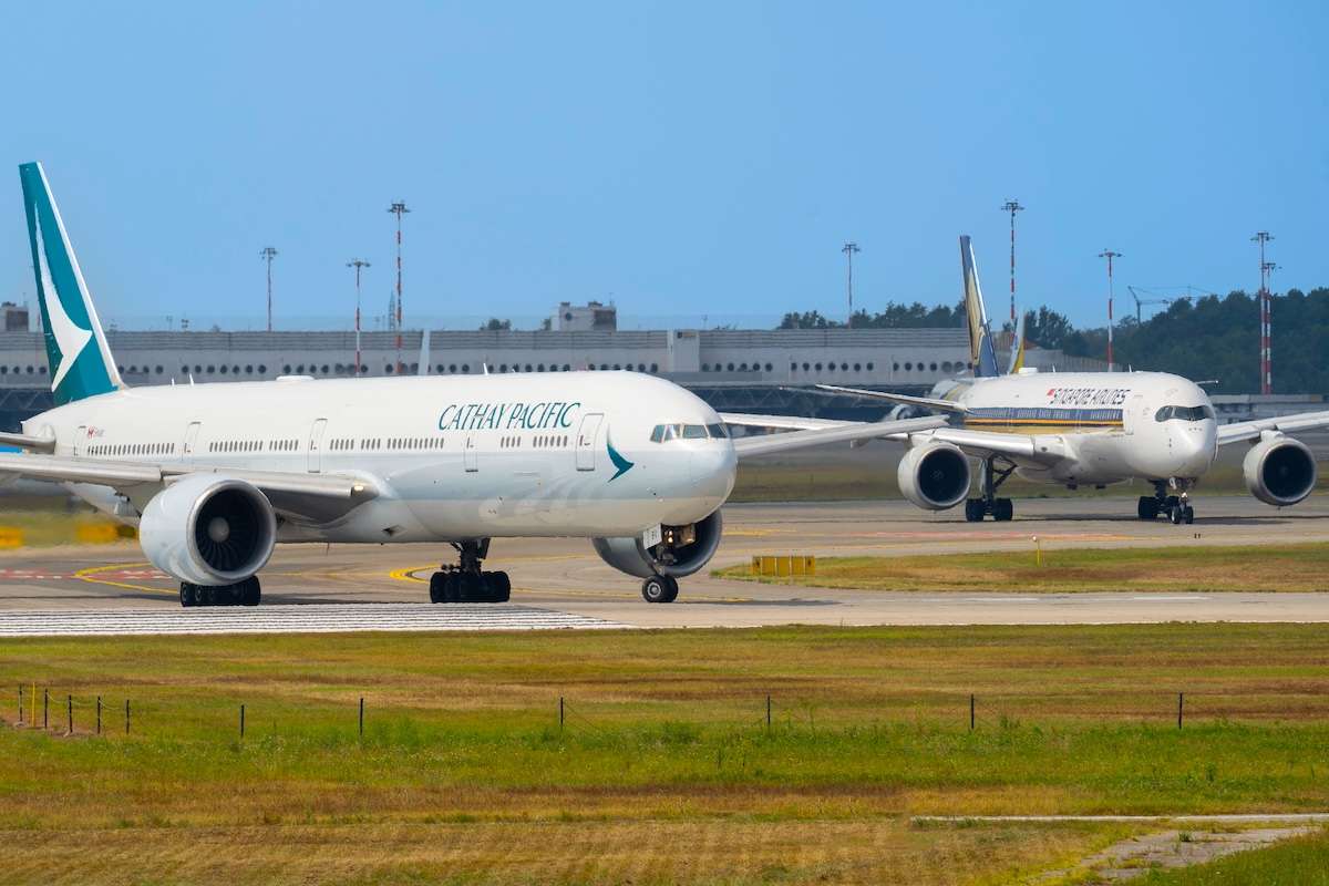Cathy Pacific and Singapore Airlines airplanes at MXP Milano Malpensa International Airport