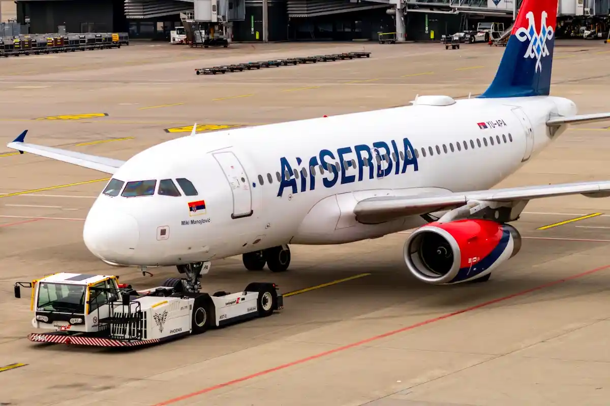 An Air Serbia Airbus A320 being towed