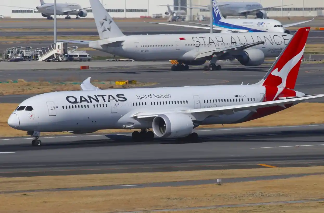 A Qantas Boeing 787-9 registered as VH-ZNG in Tokyo