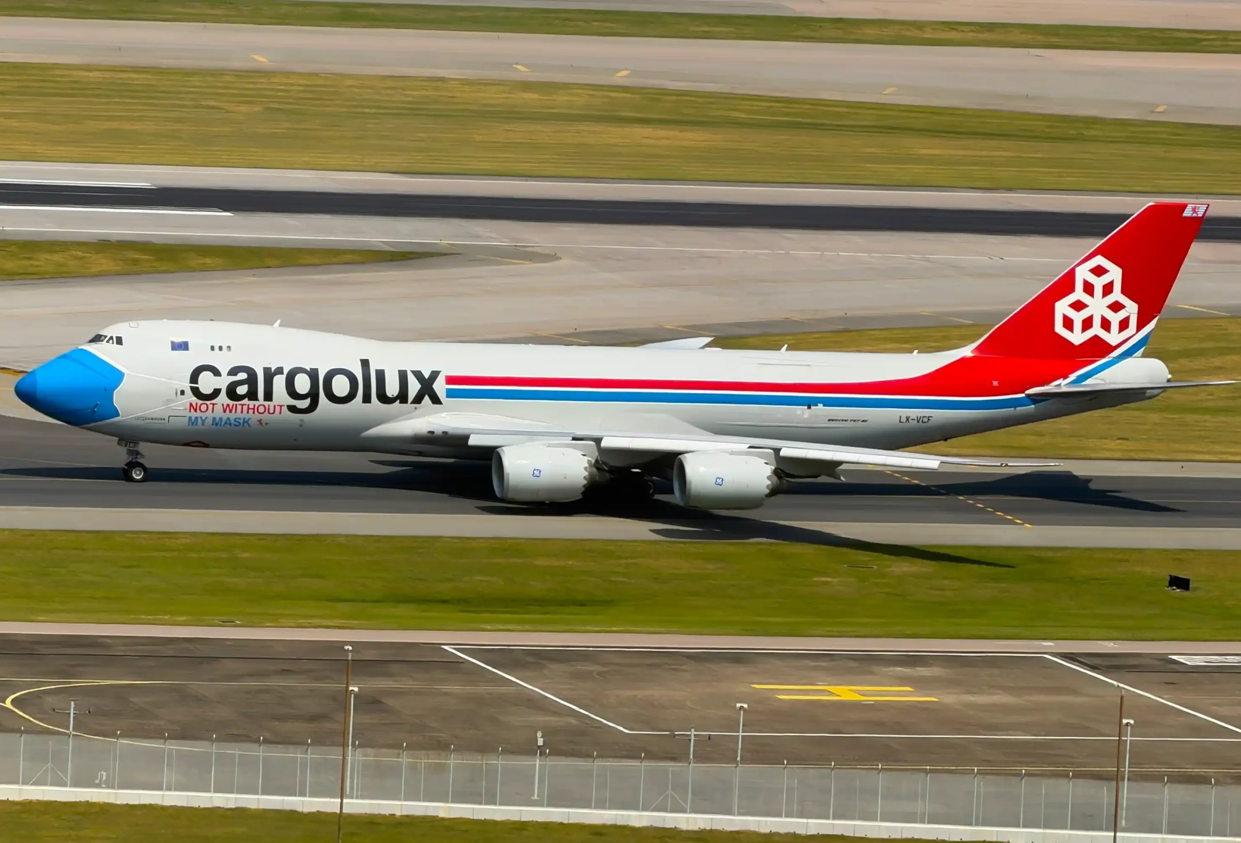 Cargolux Boeing 747-8F aircraft (registration LX-VCF) wearing the iconic "Not Without My Mask" special livery